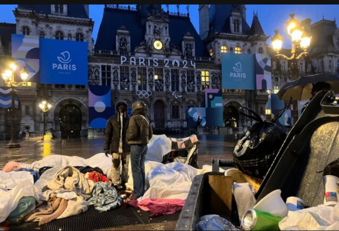 Police Remove Migrants from Central Paris Square Ahead of Olympic Games.